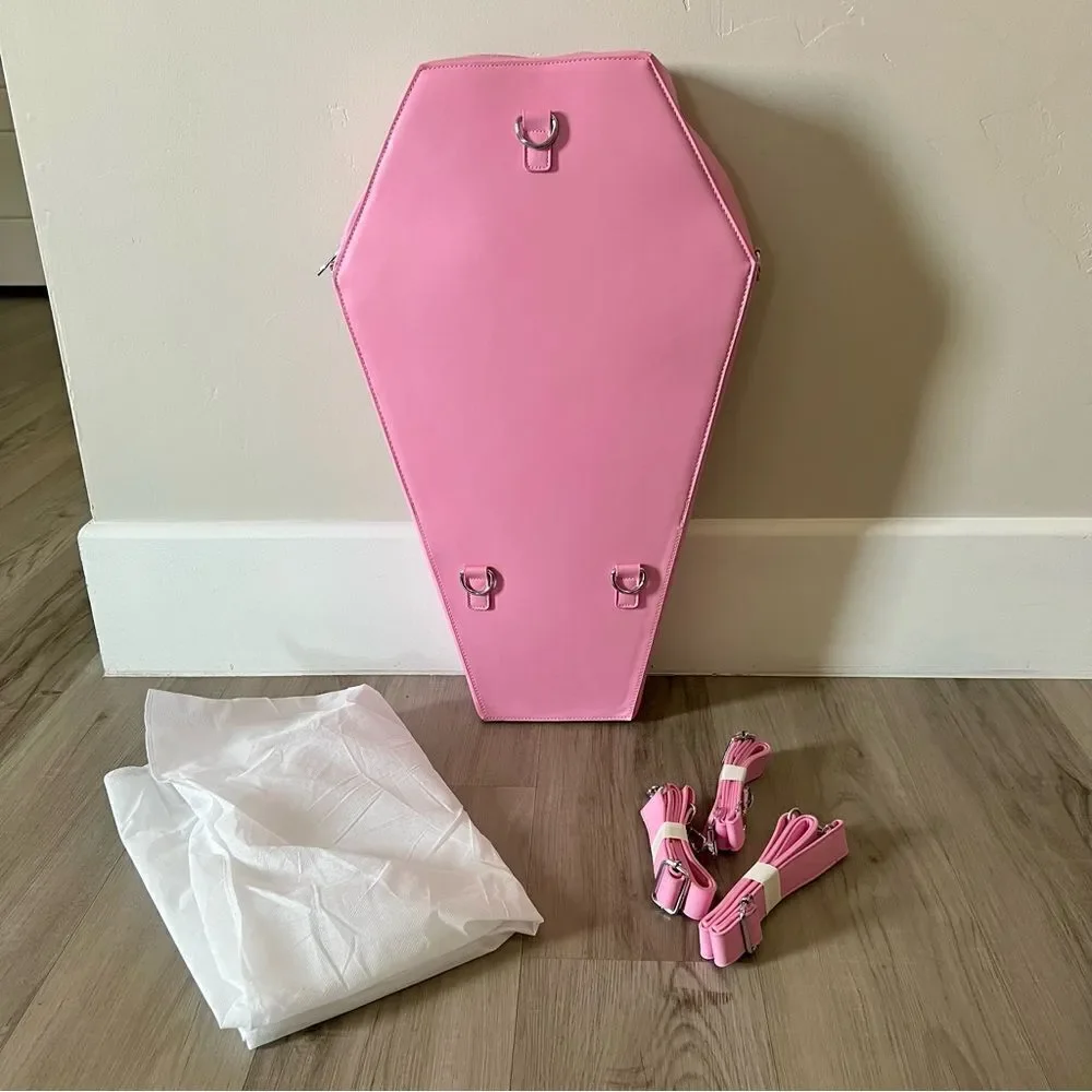 Dolls Kill oversize pink and black skull spiderweb coffin backpack. New in box